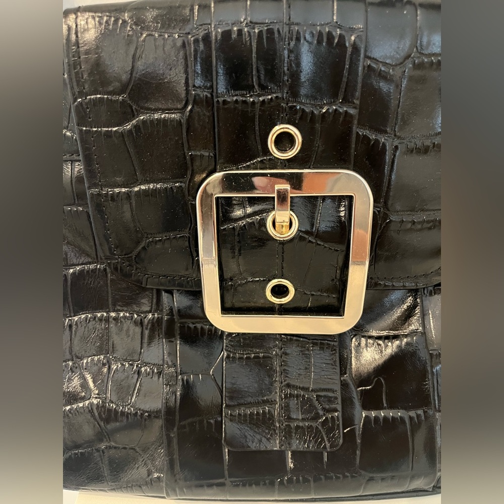 Black leather handbag with shoulder strap